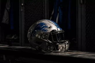 Detroit Lions helmet on a locker room bench following the release of cornerback Terrion Arnold.