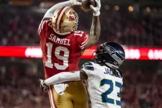 San Francisco 49ers wide receiver Brandon Aiyuk making a spectacular catch amidst Kansas City Chiefs trade rumors.